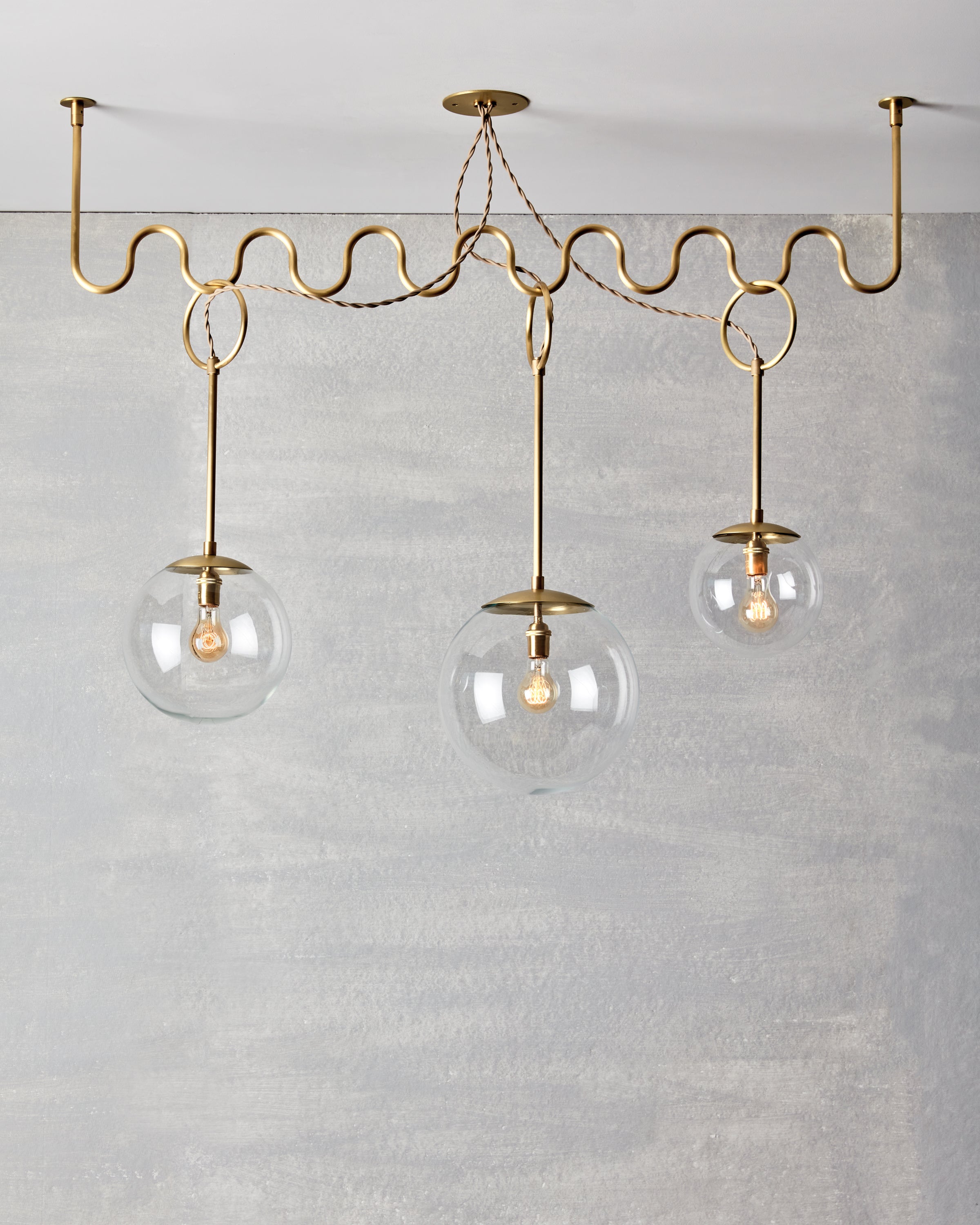 Robert True Ogden RTO Lighting 50" Cecil Adjustable Ceiling Light Chandelier - Brushed Satin Brass - Clear Glass Globes#finish_brushed-satin-brass