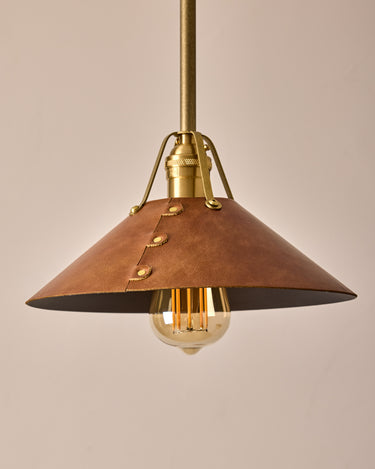 Robert True Ogden RTO Lighting - Medium Yaffa Pendant -Tumbled Brass Half Poles - Cognac Leather Shade Natural Oak Canopy#leather-shade_cognac-leather