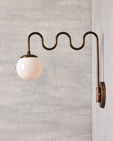 Robert True Ogden RTO Lighting Cecil Wall Sconce - Antique Brass - Clear Glass Globe#finish_antique-brass #glass_milk-glass