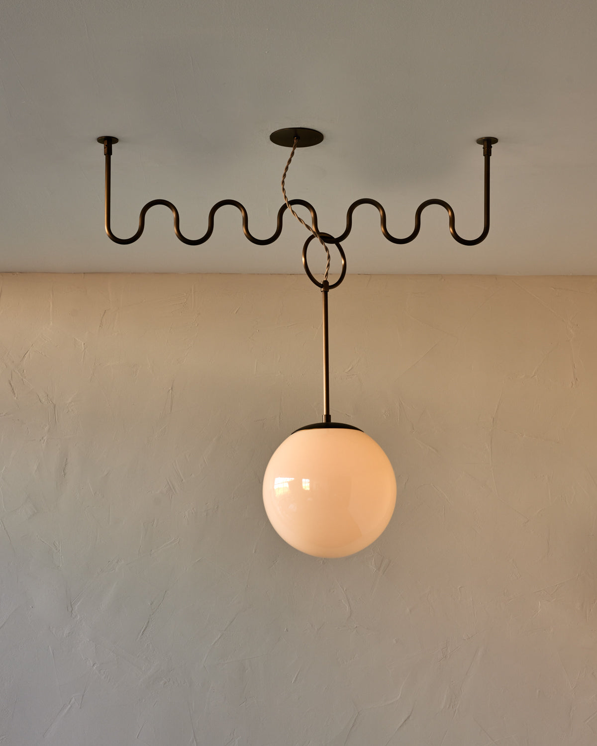 Robert True Ogden RTO Lighting 36" Cecil Adjustable Ceiling Light Chandelier - Antique Brass - One 12 Inch Milk Glass Globes#finish_antique-brass