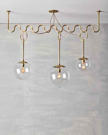 Robert True Ogden RTO Lighting 50" Cecil Adjustable Ceiling Light Chandelier - Brushed Satin Brass - Clear Glass Globes#finish_brushed-satin-brass