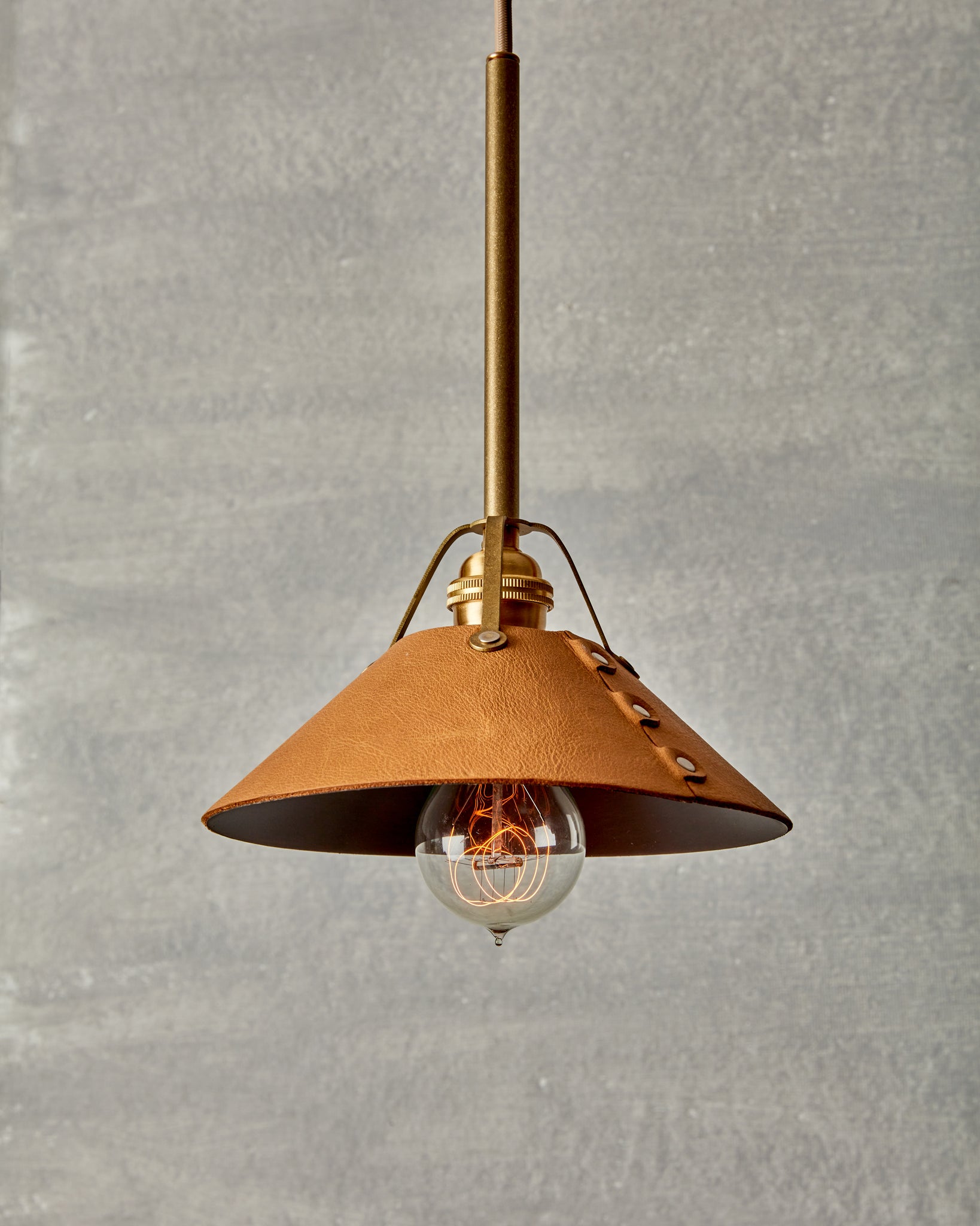 Robert True Ogden RTO Lighting - Small Yaffa Pendant -Tumbled Brass Half Poles - Natural Leather Shade Natural Oak Canopy#leather_natural