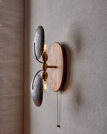 Robert True Ogden RTO Lighting - Greta Wall Sconce - Two Hammered Oil Rubbed Bronze Shades -Brushed Satin Brass Armature - Oval Walnut Backplate with Pull Chain#switch_hardwired-with-pull-chain