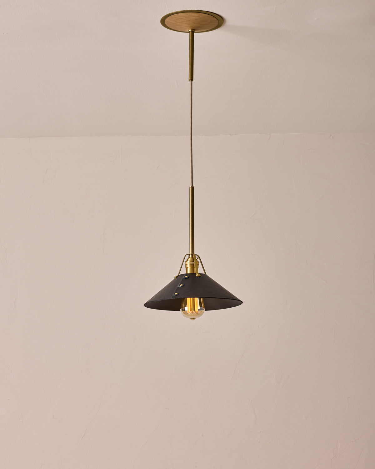 Robert True Ogden RTO Lighting - Medium Yaffa Pendant -Tumbled Brass Half Poles - Black Leather Shade Natural Oak Canopy#leather-shade_black-leather