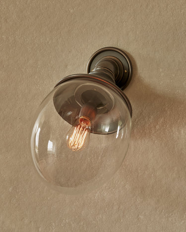 Robert True Ogden RTO Lighting - Faye Wall Sconce - Cast Bronze - Clear Egg Shaped Globe#finish_oil-rubbed-bronze
