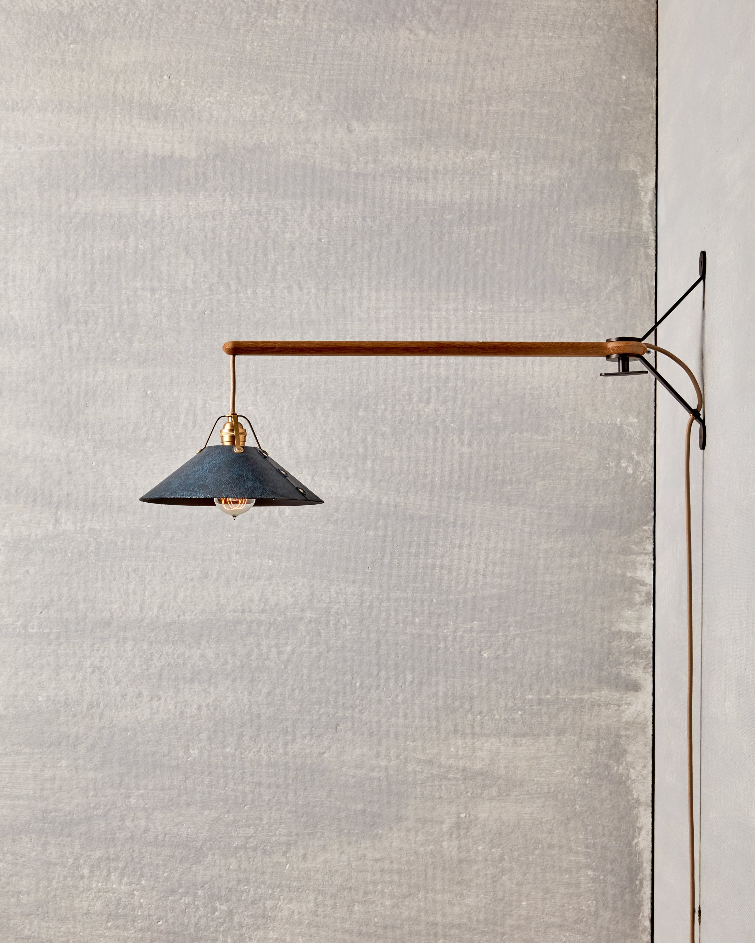 Robert True Ogden RTO Lighting - Medium Yaffa Swing Arm Sconce - Plug In - Navy Leather Shade - Natural Oak Arm - Oil Rubbed Brass Wall Brackets#leather-shade_navy